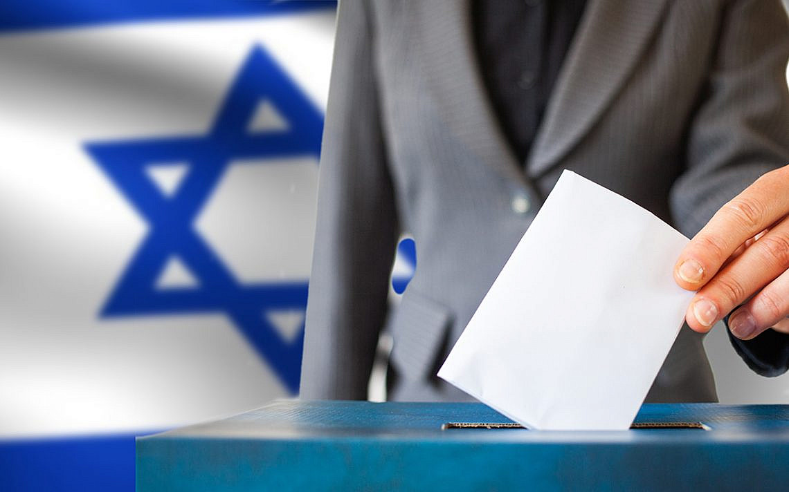 israel elections hand putting vote in ballot